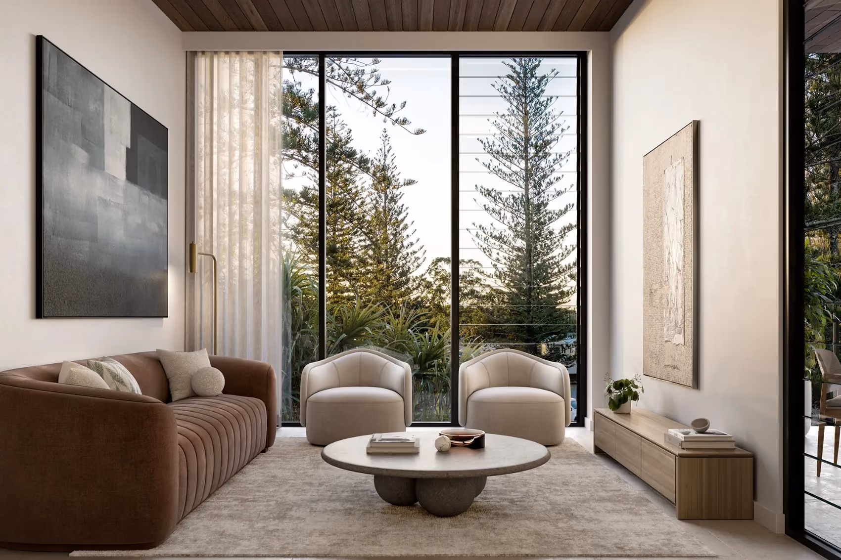 Modern townhouse living room featuring neutral furnishings, large windows, and greenery.