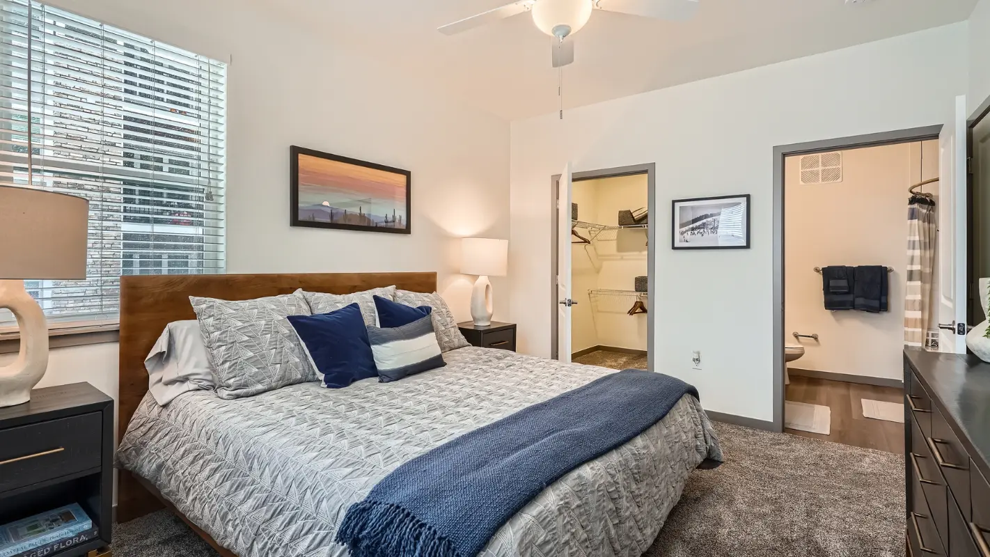 Primary bedroom with walk-in closet at Polaris Apartments in Broomfield, Colorado