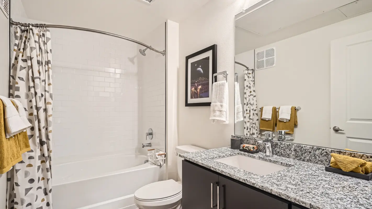 Bathroom with bathtub at Polaris Apartments in Broomfield, Colorado