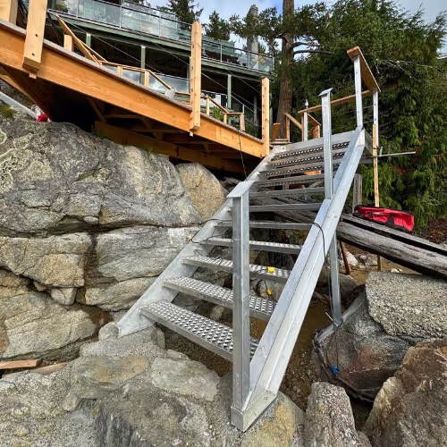Custom metal gangway and staircase built by CoastMetalWorks for BC waterfront access