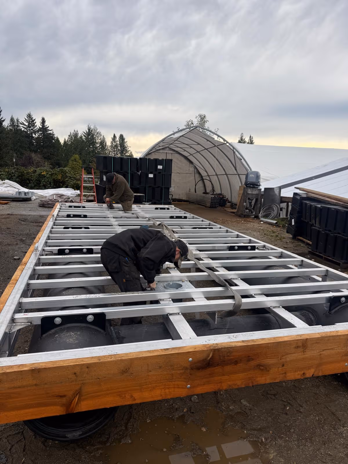 Aluminum floating dock with fiberglass reinforced mesh decking built for BC waterfront