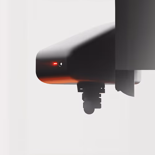 Close-up of a sleek black futuristic device with a glowing red light on its side.