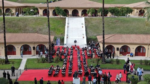 a group of people in a courtyard