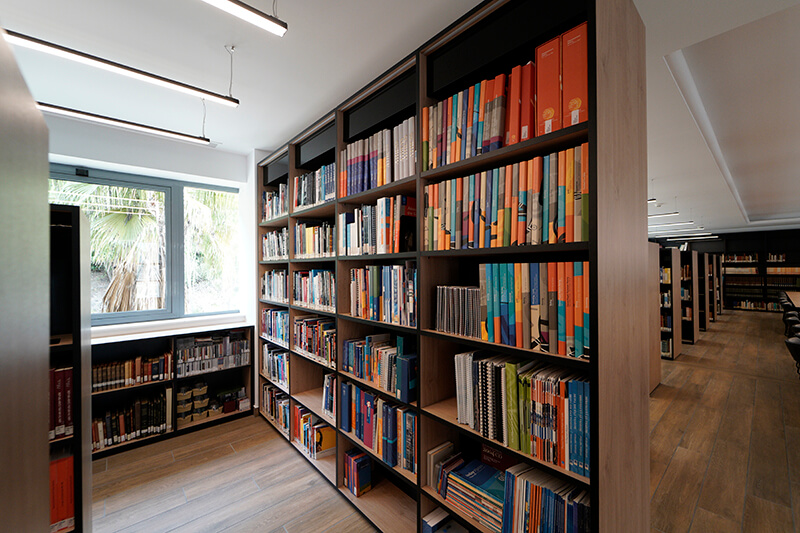 Participans at the stele of Baron Pierre de Coubertin