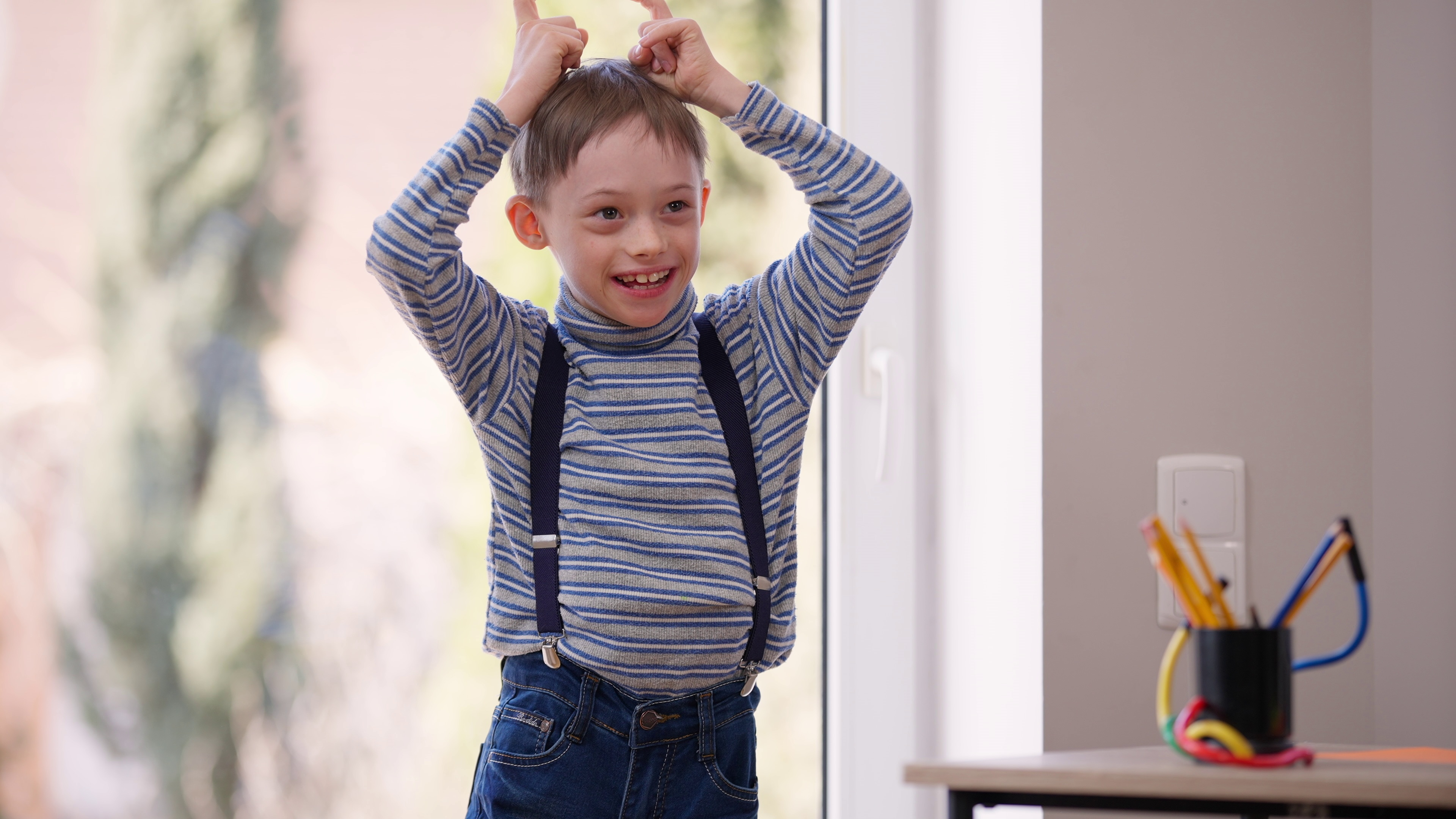 Child with autism showing happiness