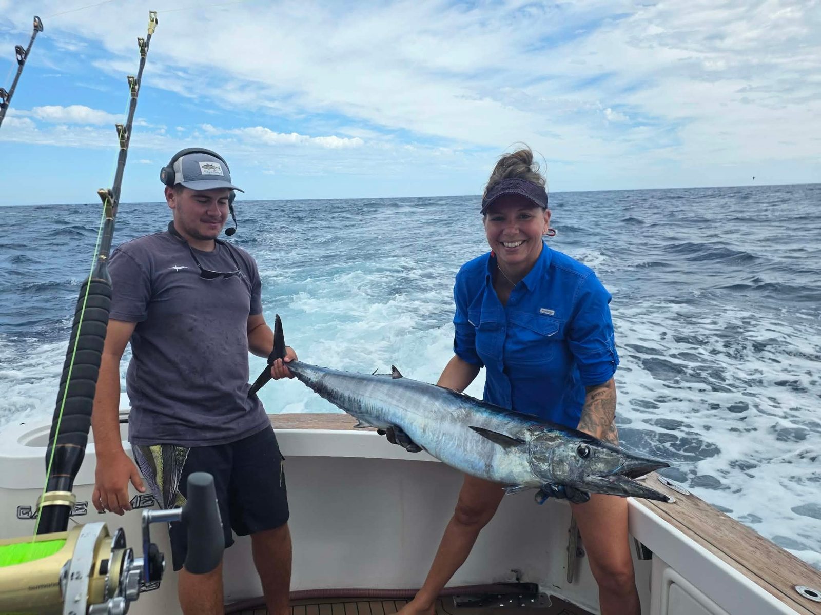 Game Time Charters crew holding a wahoo caught on a Perth game fishing charter