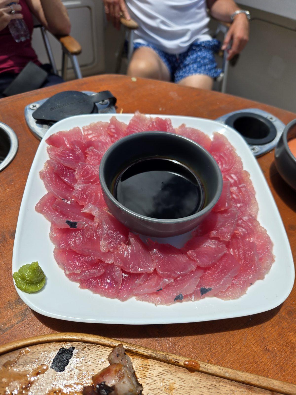 Fresh sashimi prepared on board from the day's catch with Game Time Charters