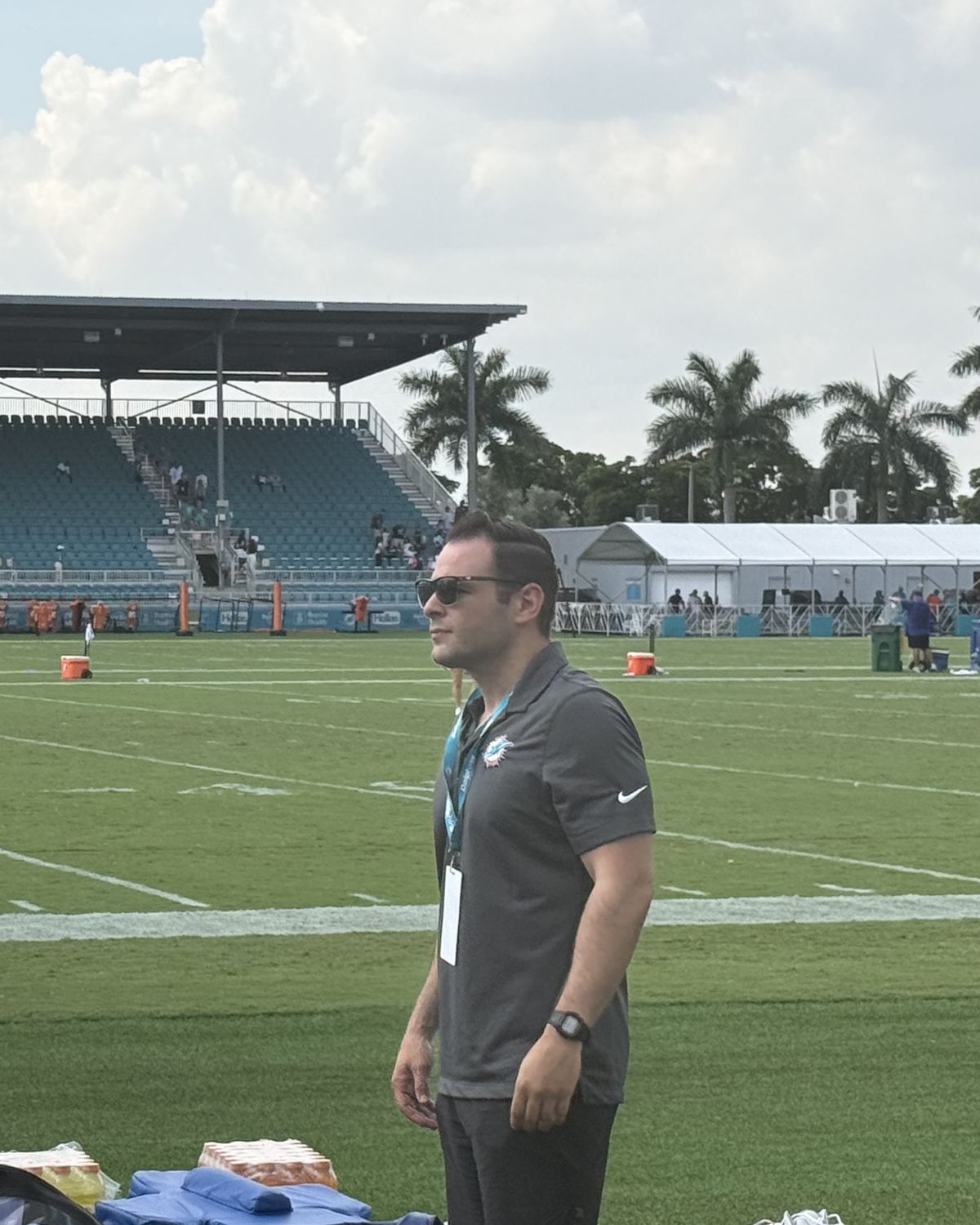 A FORS attorney watching practice from the sideline at an NFL training camp