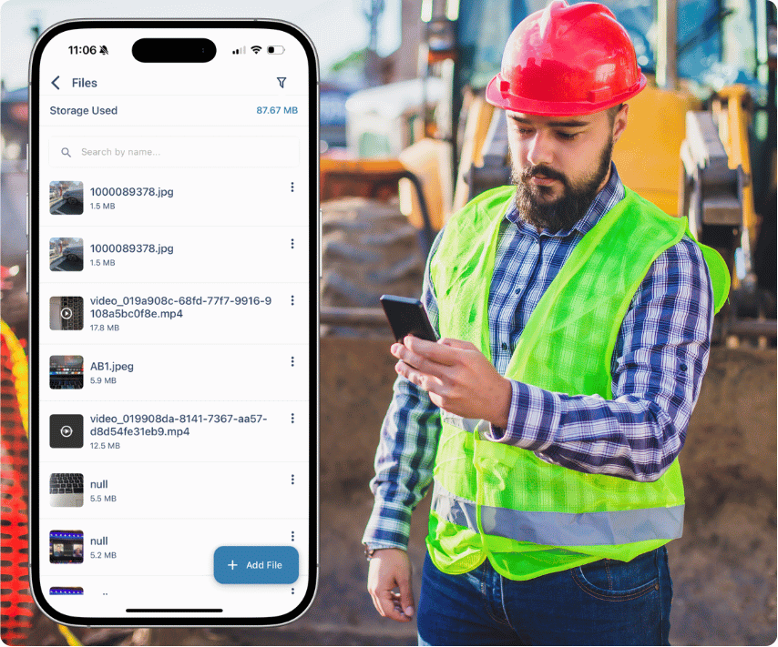 Worker in a blue uniform and helmet checks irradiance readings on a smartphone with a graph overlay.