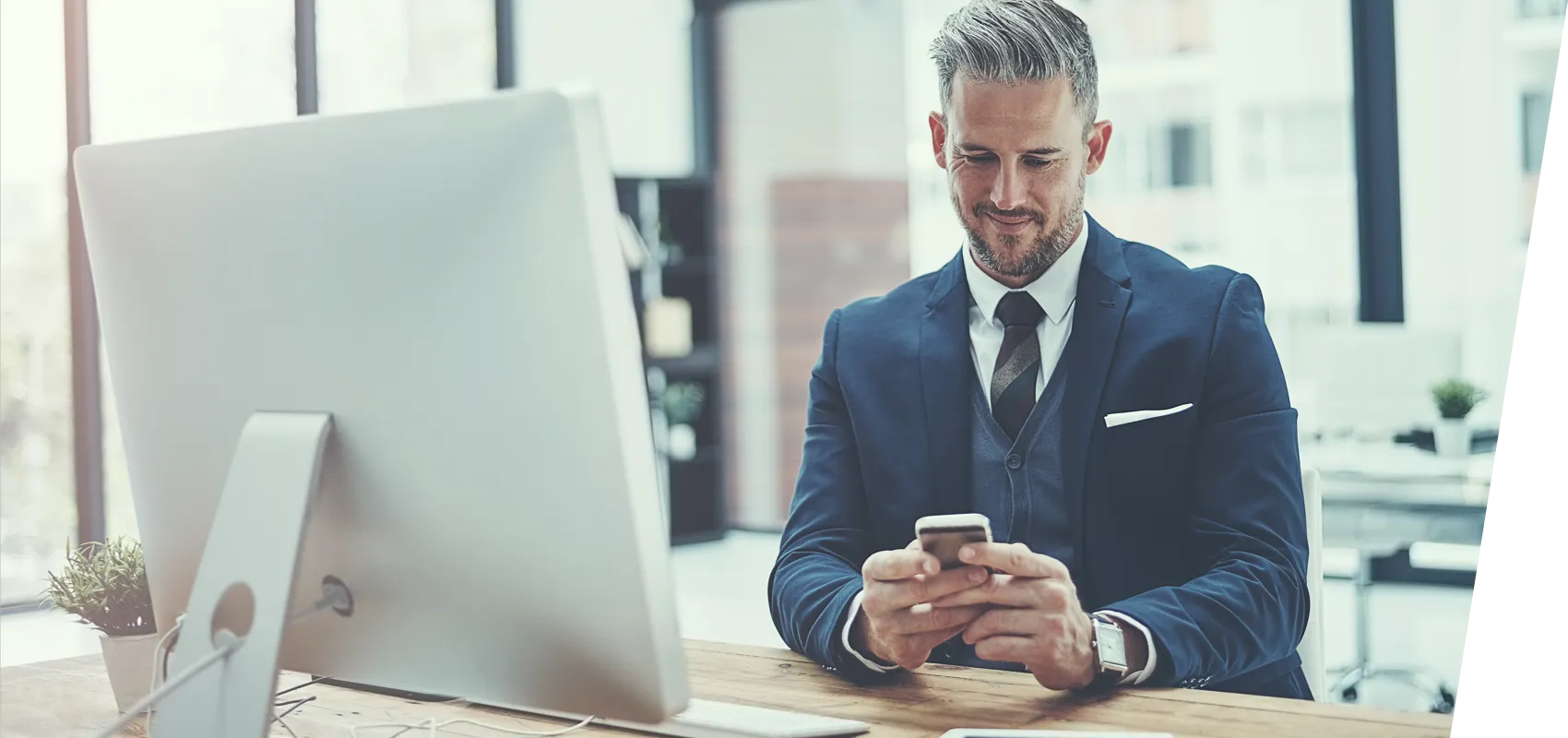 Business man looking at bank accounts on phone