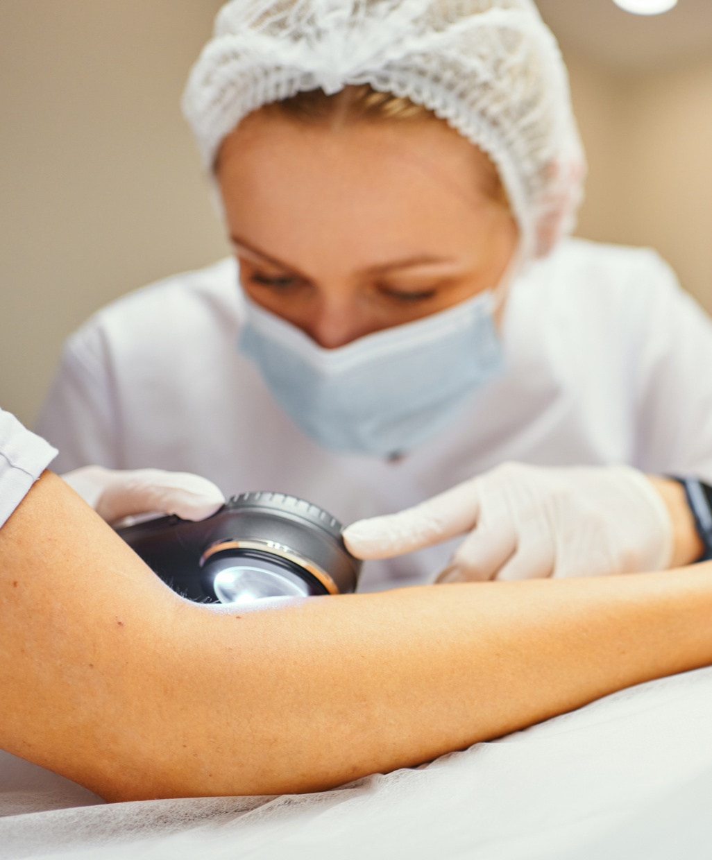 Dermatologist using equipment