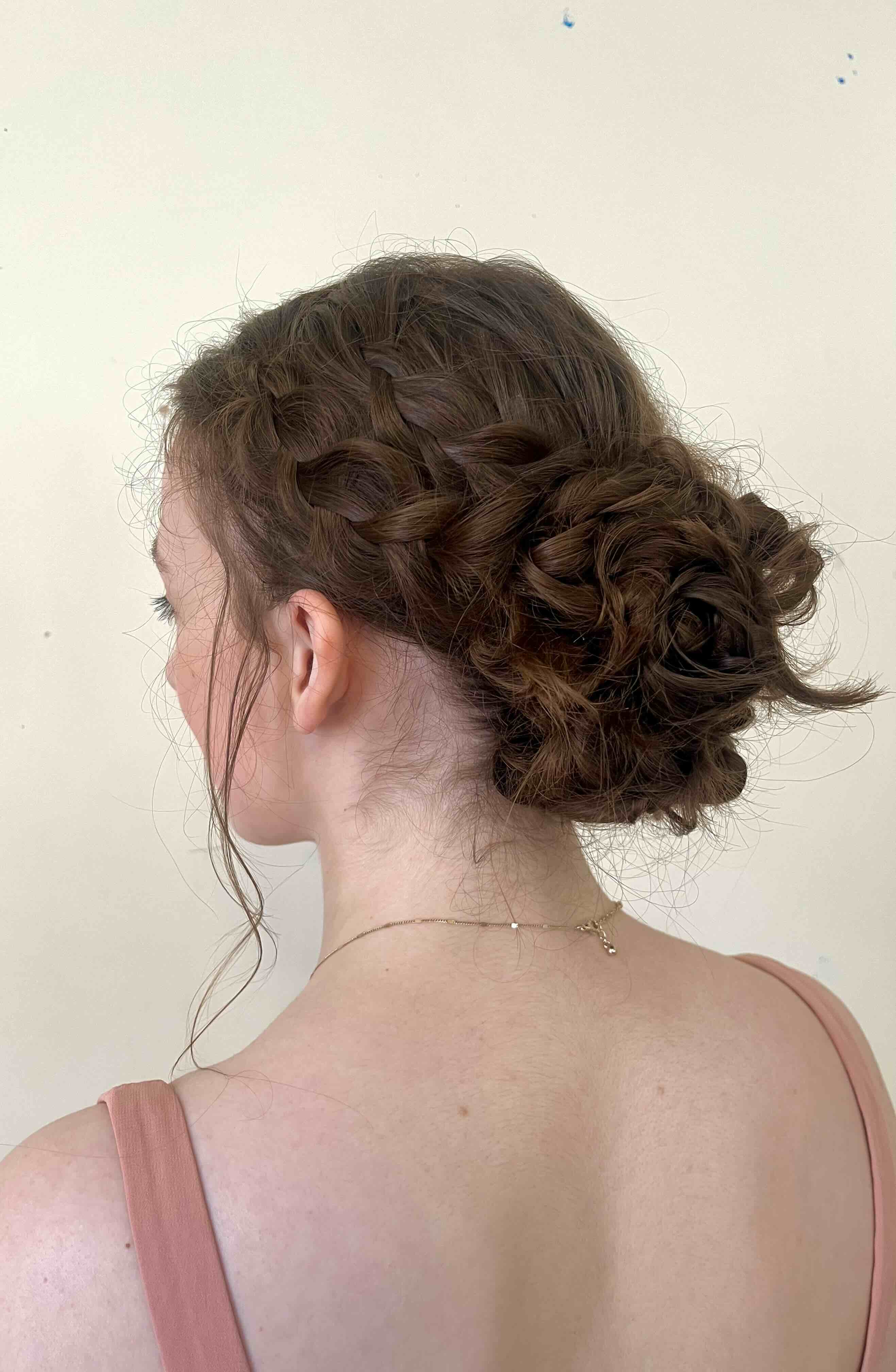 Bride with brunette hair in an elegant updo.