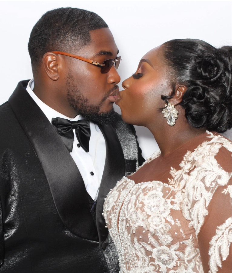 Black couple in a digital memories photobooth rental in toronto