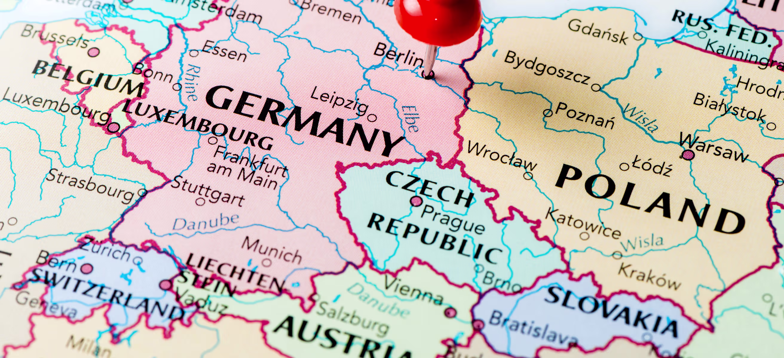 Map of Central Europe with a red pushpin marking Berlin, Germany and DACH region
