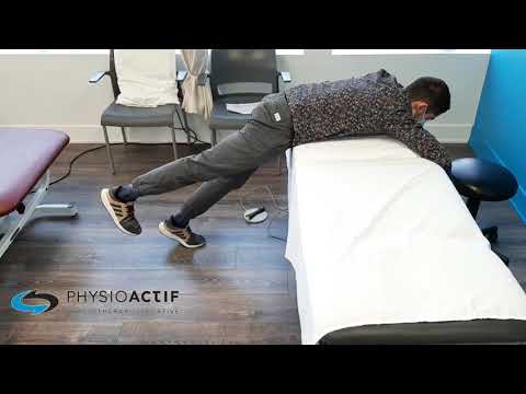 Exercice Fessier en bout de table - version lombaire - démonstration physiothérapie