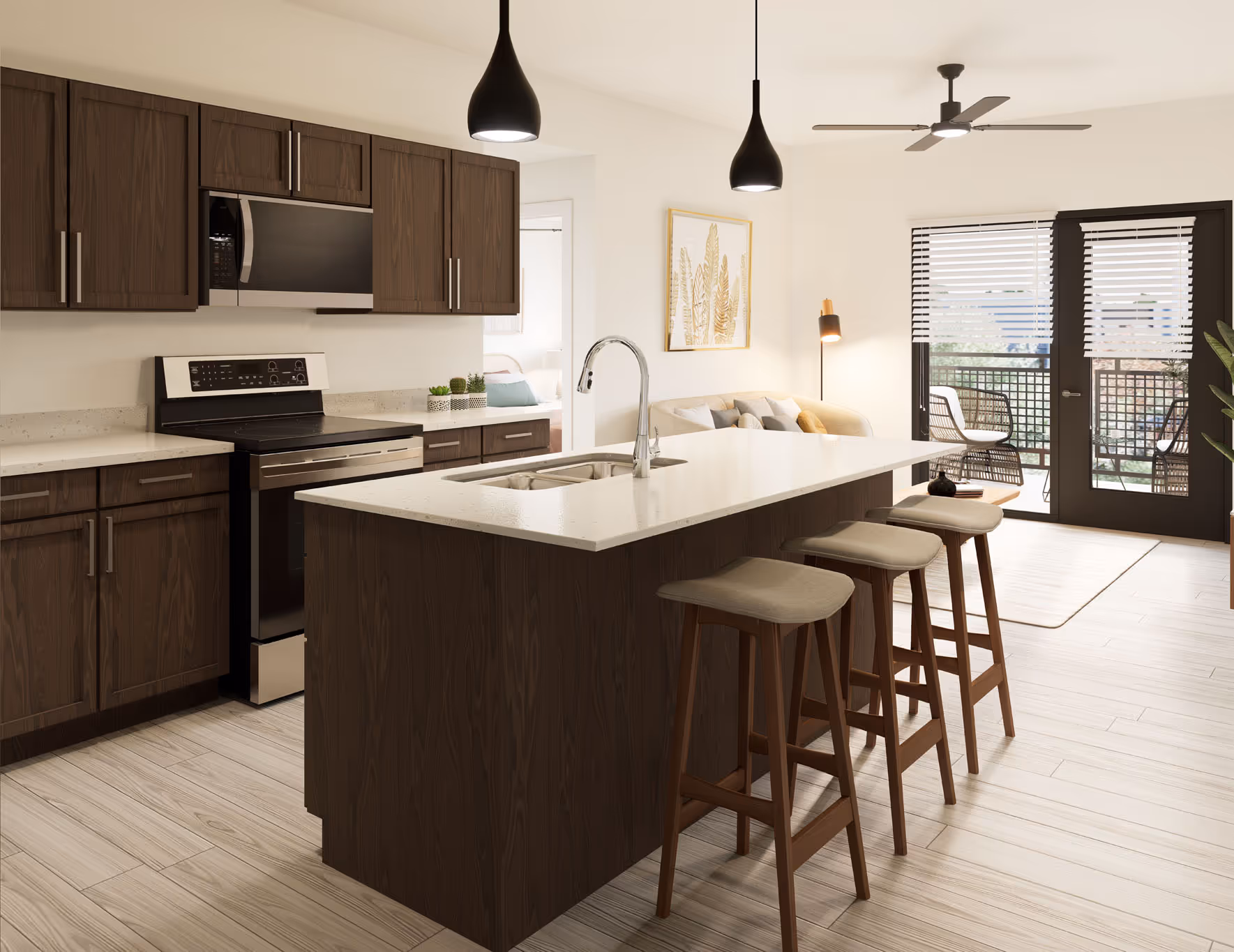 Modern apartment kitchen with dark wood cabinets, a large island with bar seating, and stainless steel appliances, at Avondale Commons in Avondale, AZ.
