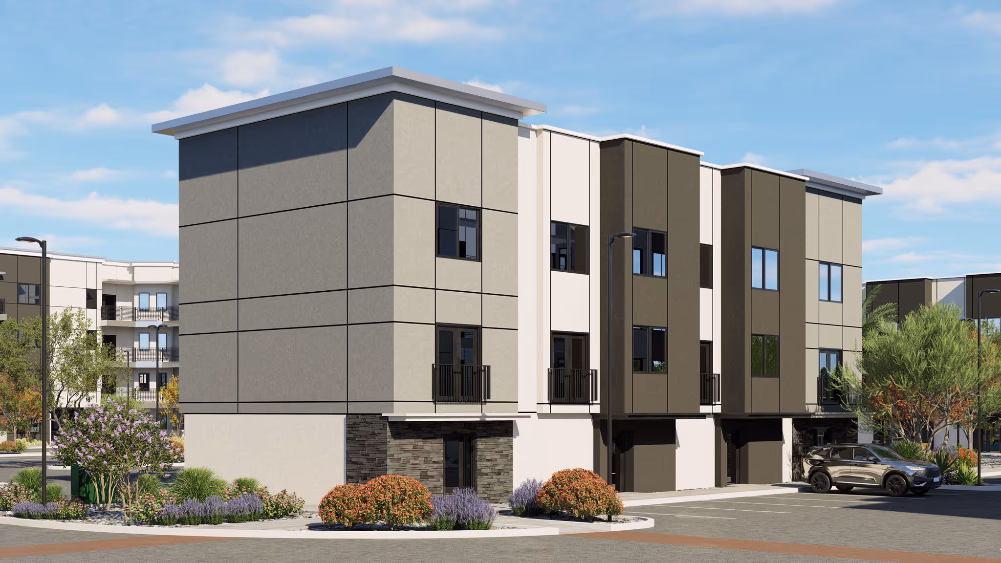 Exterior rendering of a modern apartment building with a mix of light and dark siding, balconies, and parking at Avondale Commons in Avondale, AZ.