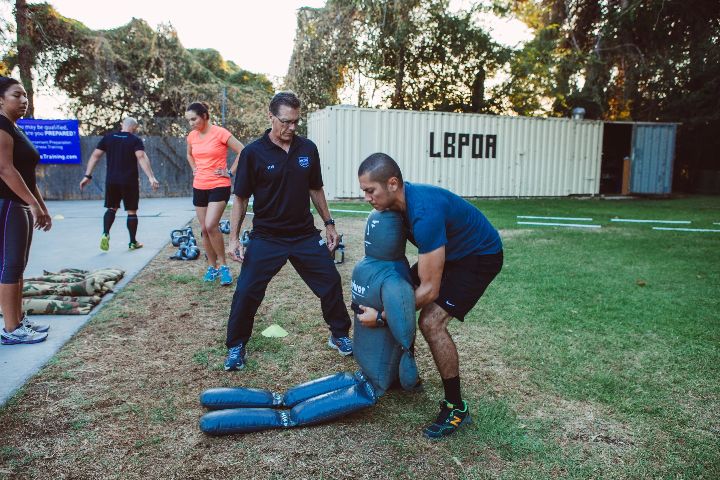 S2 lead instructor Stan Appel coaching a recruit through a takedown drill