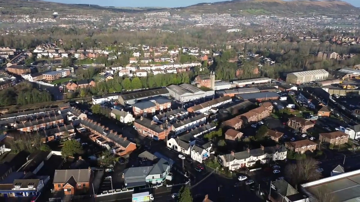 Overhead view of Dunmurry, showing a blend of residential neighborhoods and local community spaces.