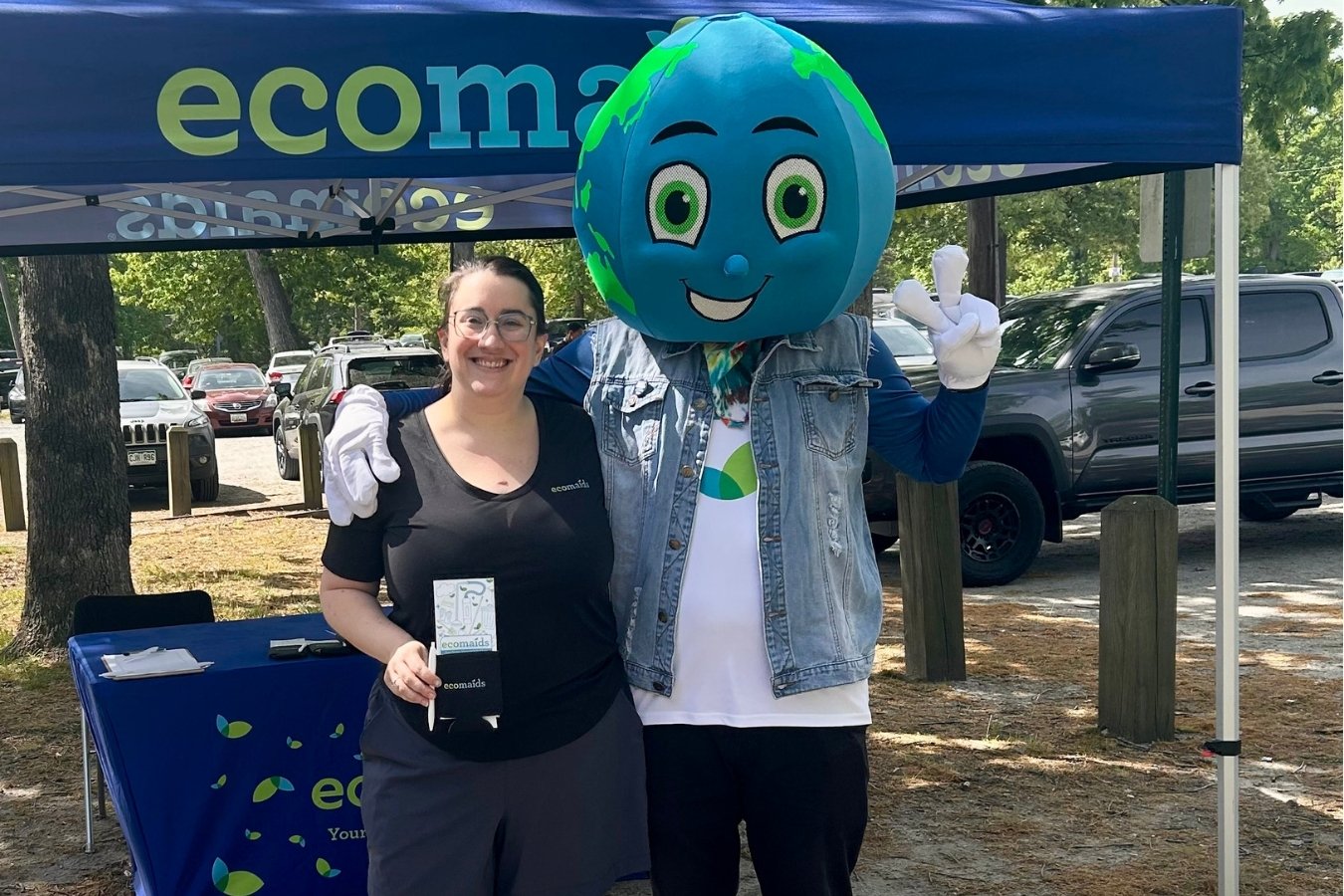 Ecomaids photo with man wearing earth costume