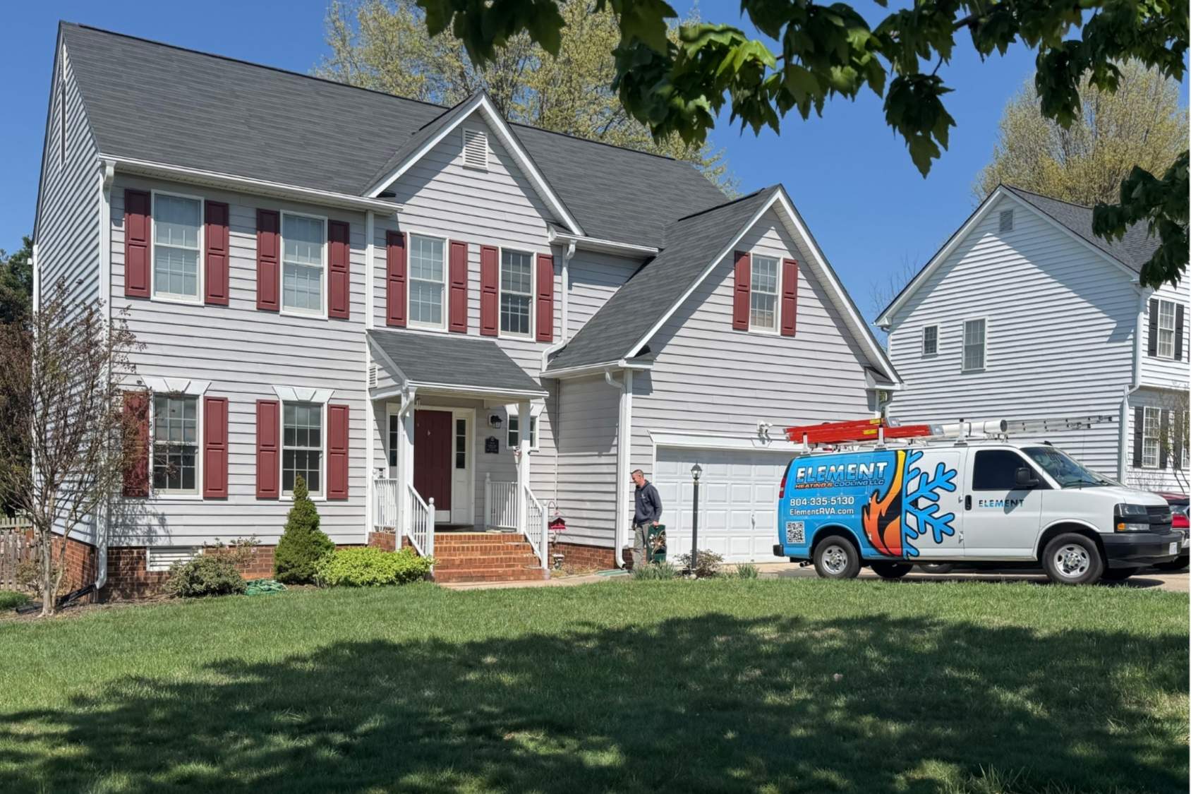 Element Heating & Cooling Work Van in front of house