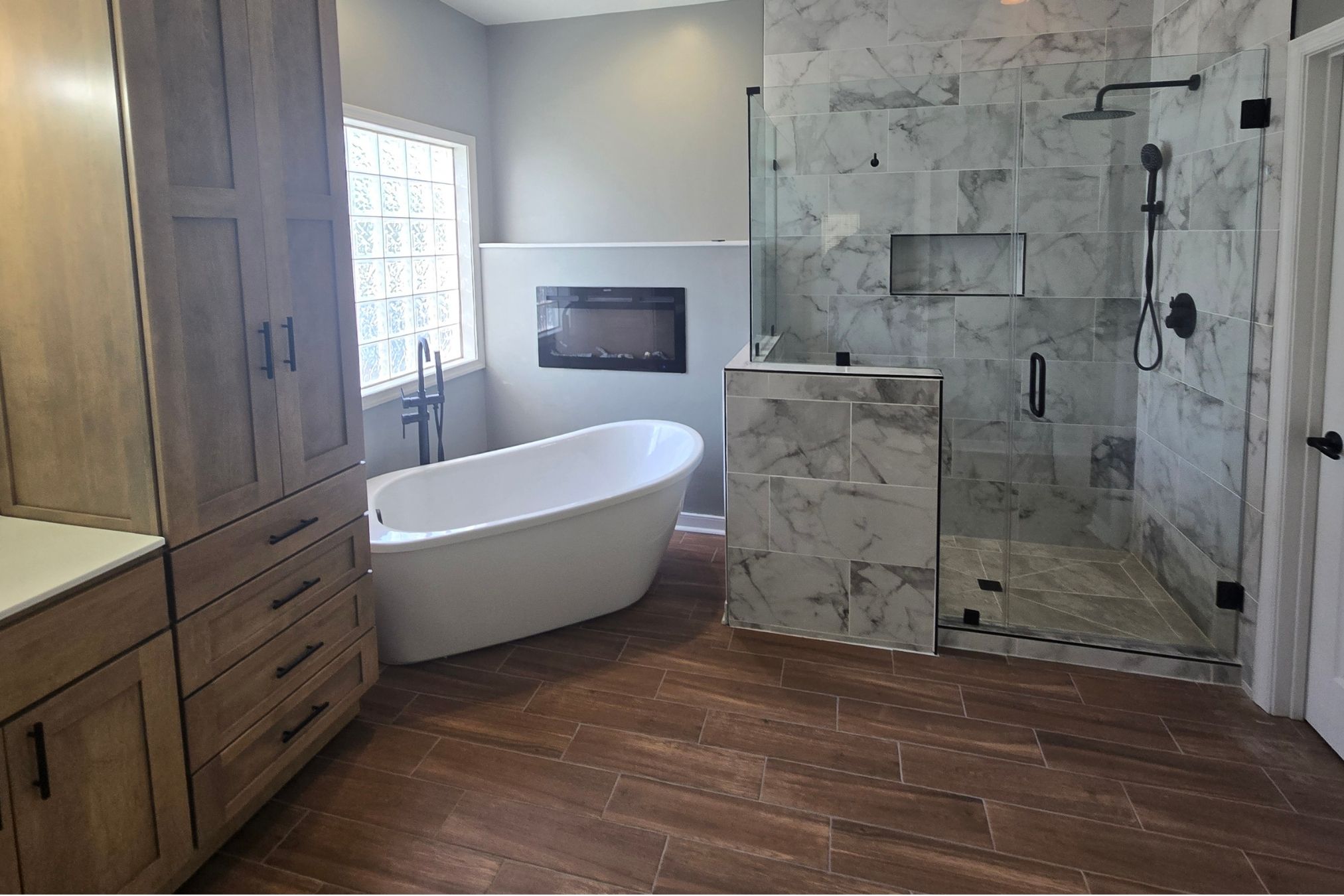 Bathroom remodel with shower, tub, and vanity