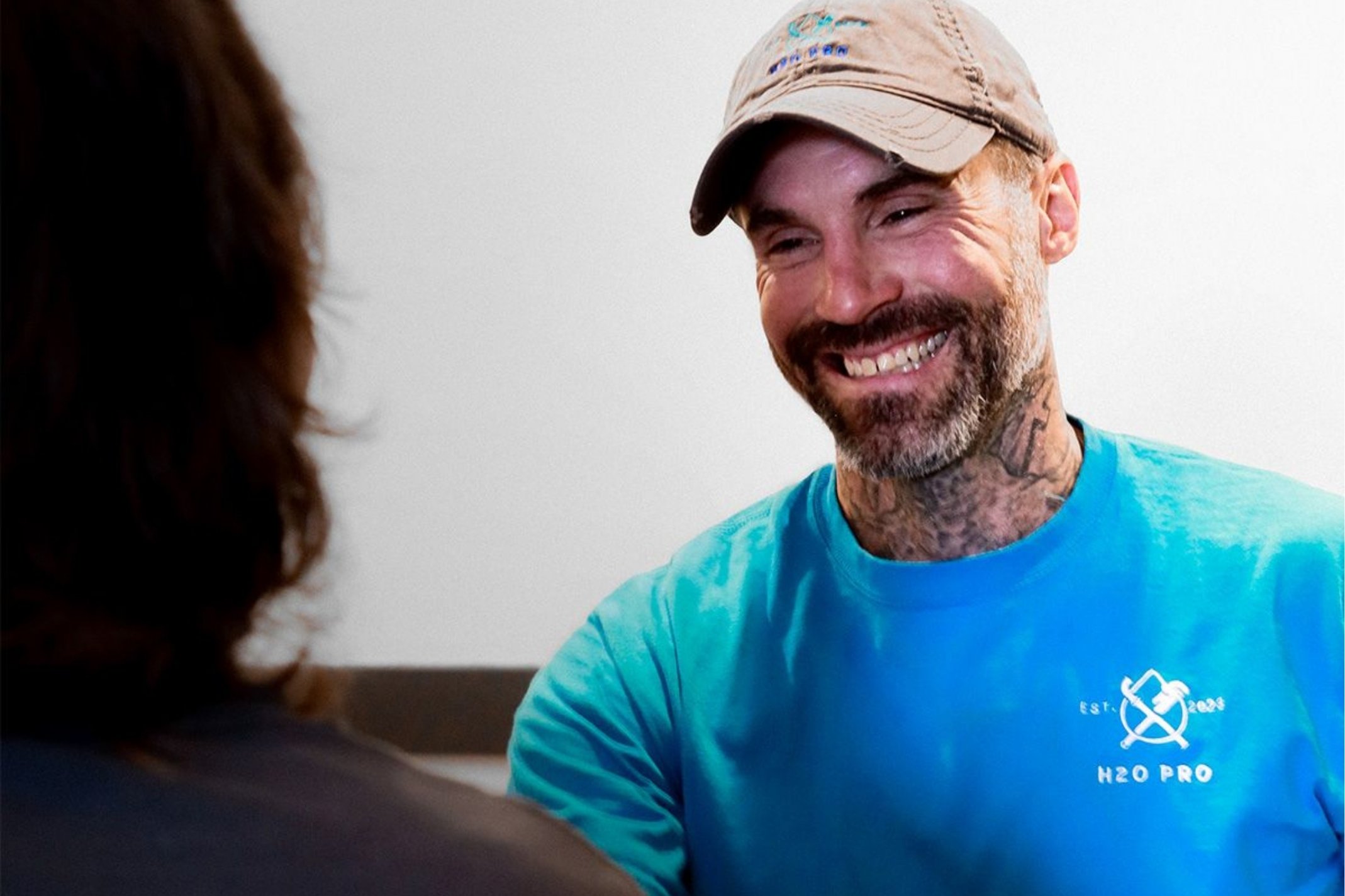 Jonathan Mullins with a customer.