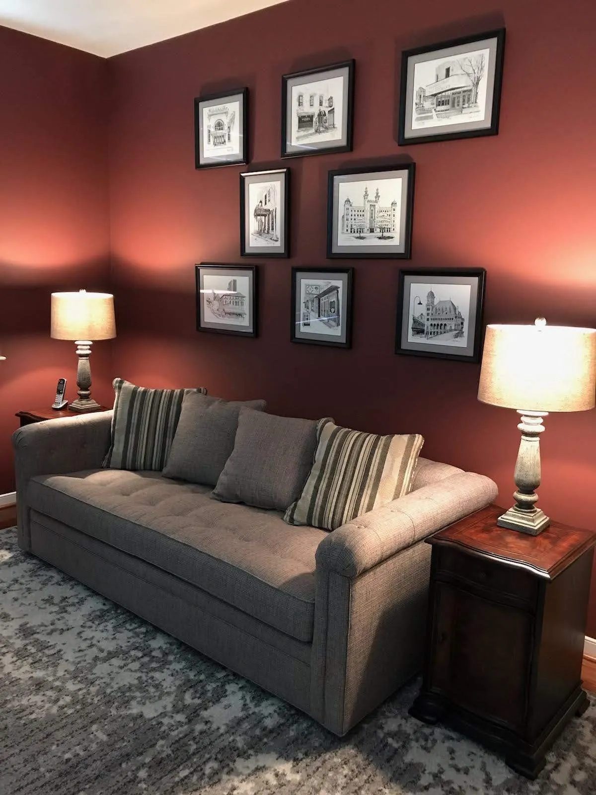 Red wall interior painting for living room with lamps