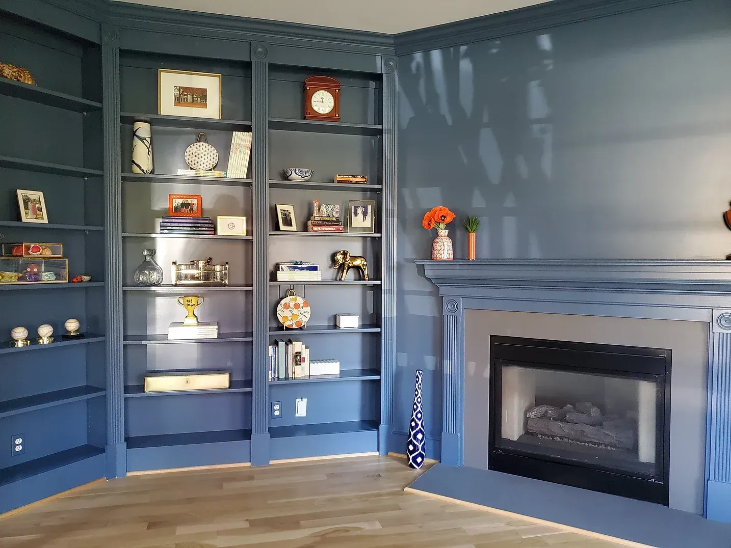 Freshly painted blue office space with gas fireplace