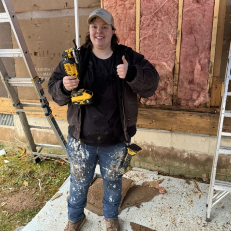 Woman holding a cordless 