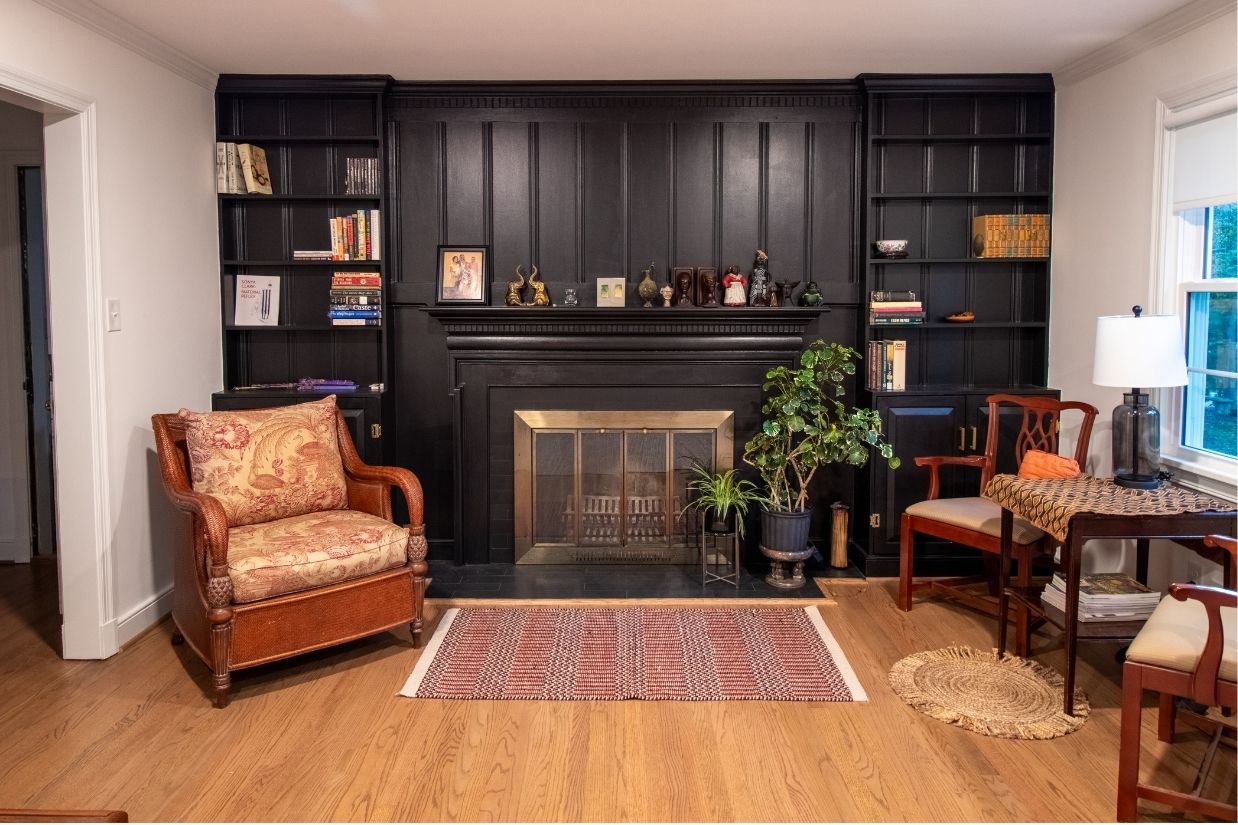 Living space with dark built in shelves