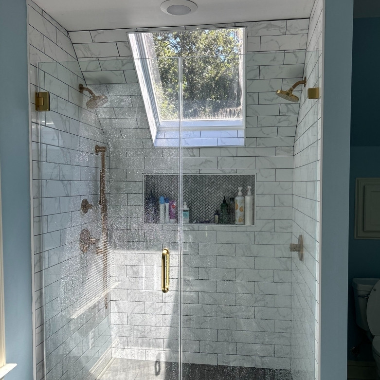 Shower and tile work with ceiling window