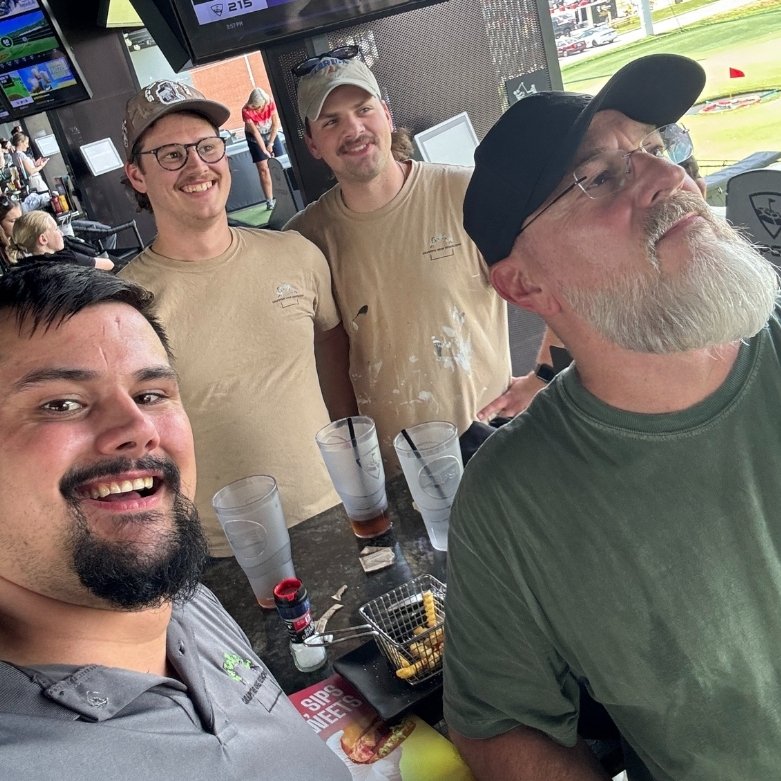 Four men at a team outing