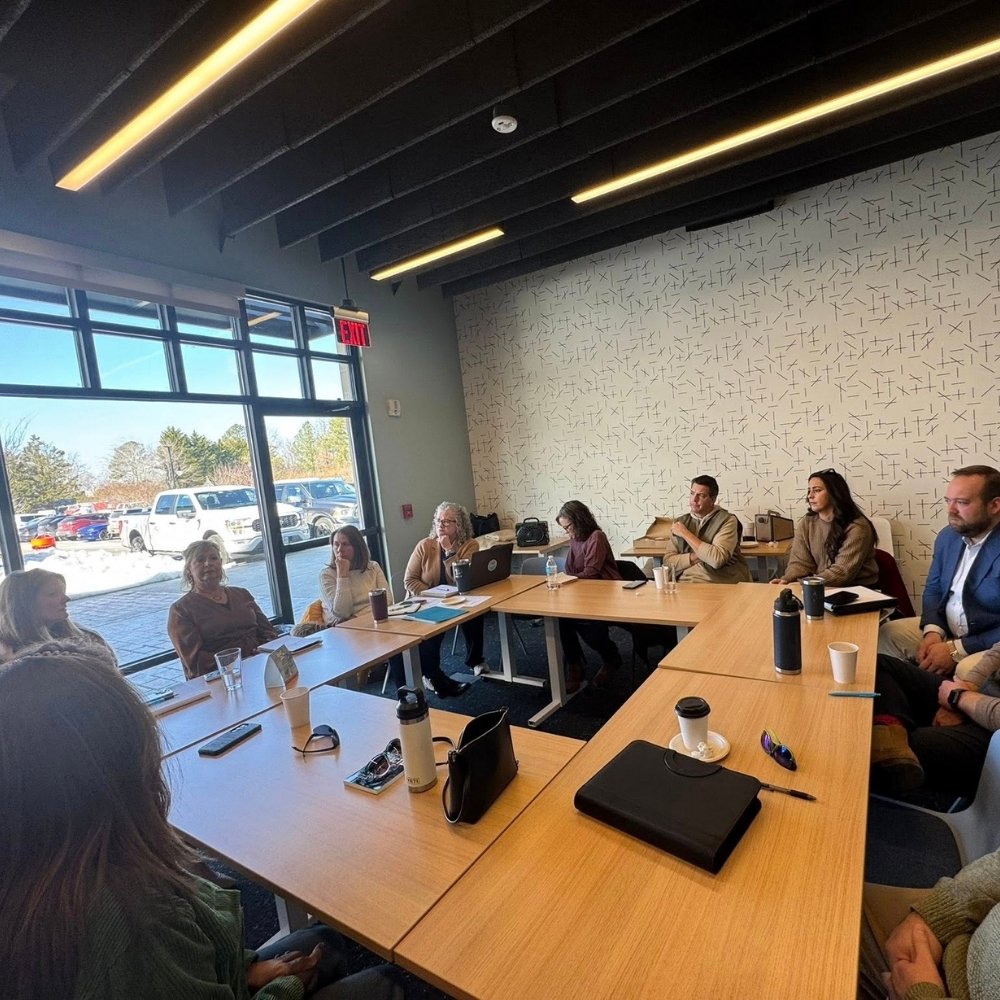 Overview of a room shot of a S.A.L.T. meeting