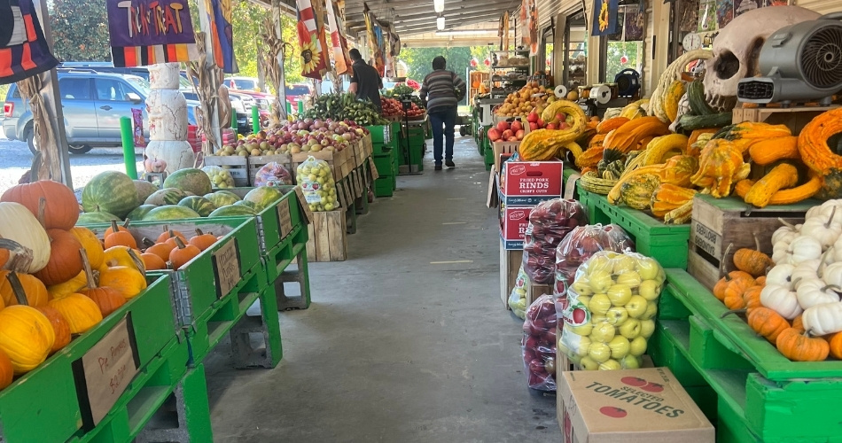 market aisle with vegetables at Pole Green Produce