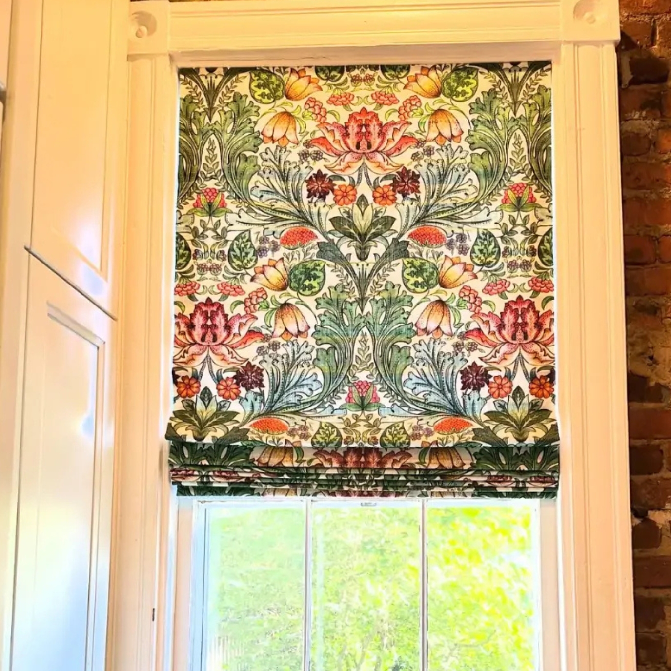 Fabric window treatment on door