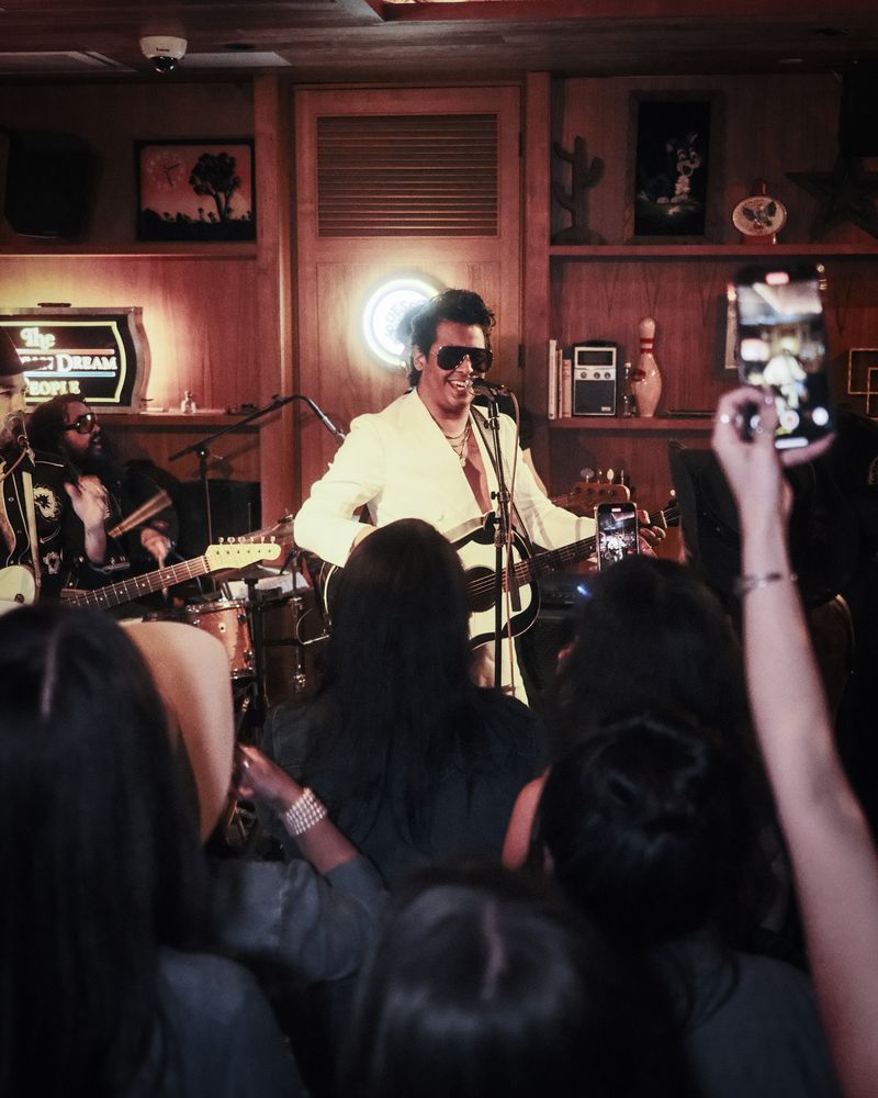 Man in Sunglasses playing guitar