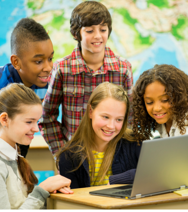 Two students working together at a table, representing personalized ACT and SAT tutoring for children