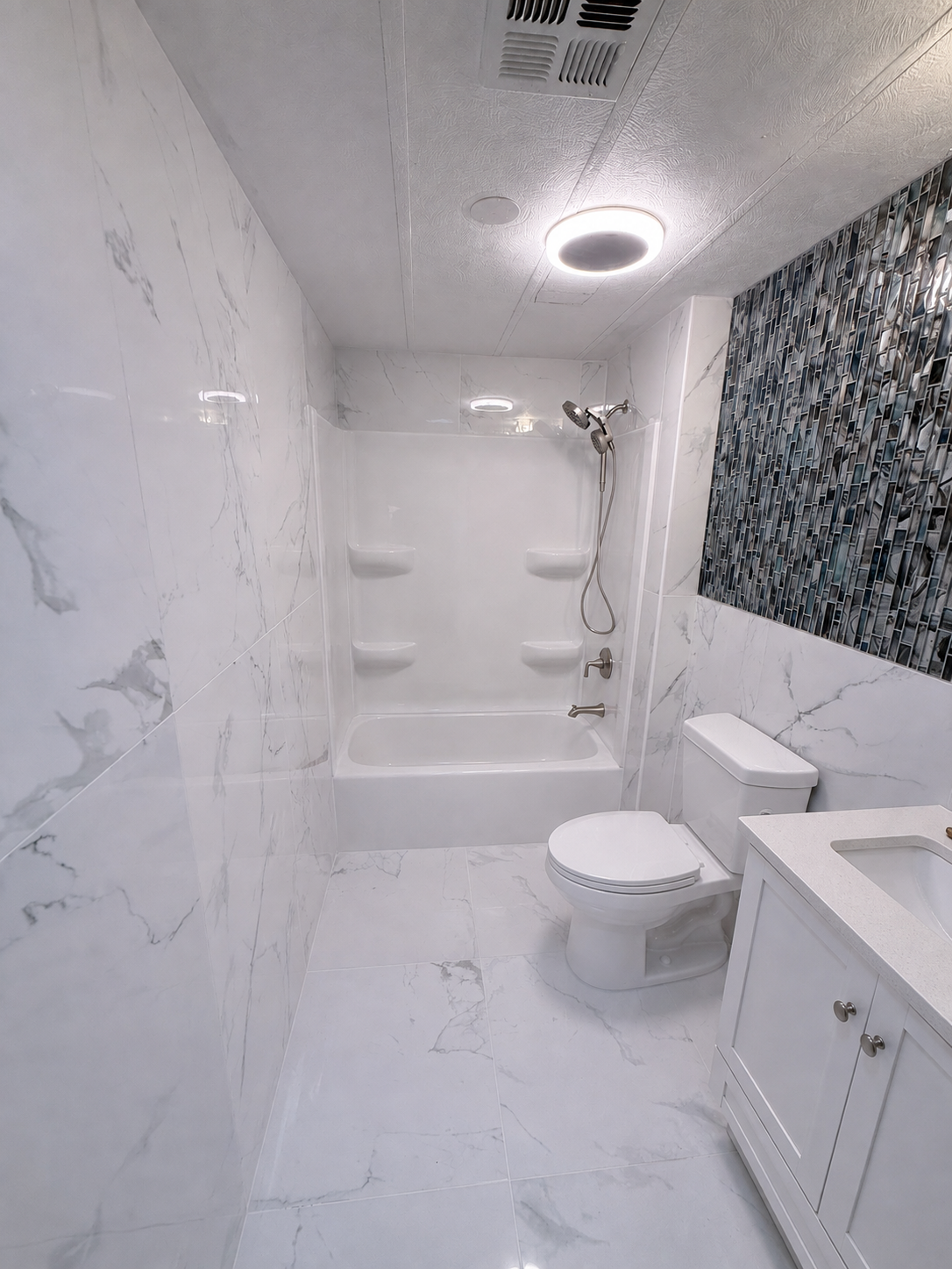 Finished Carrara-look tub and shower tile remodel in Sedona, Arizona