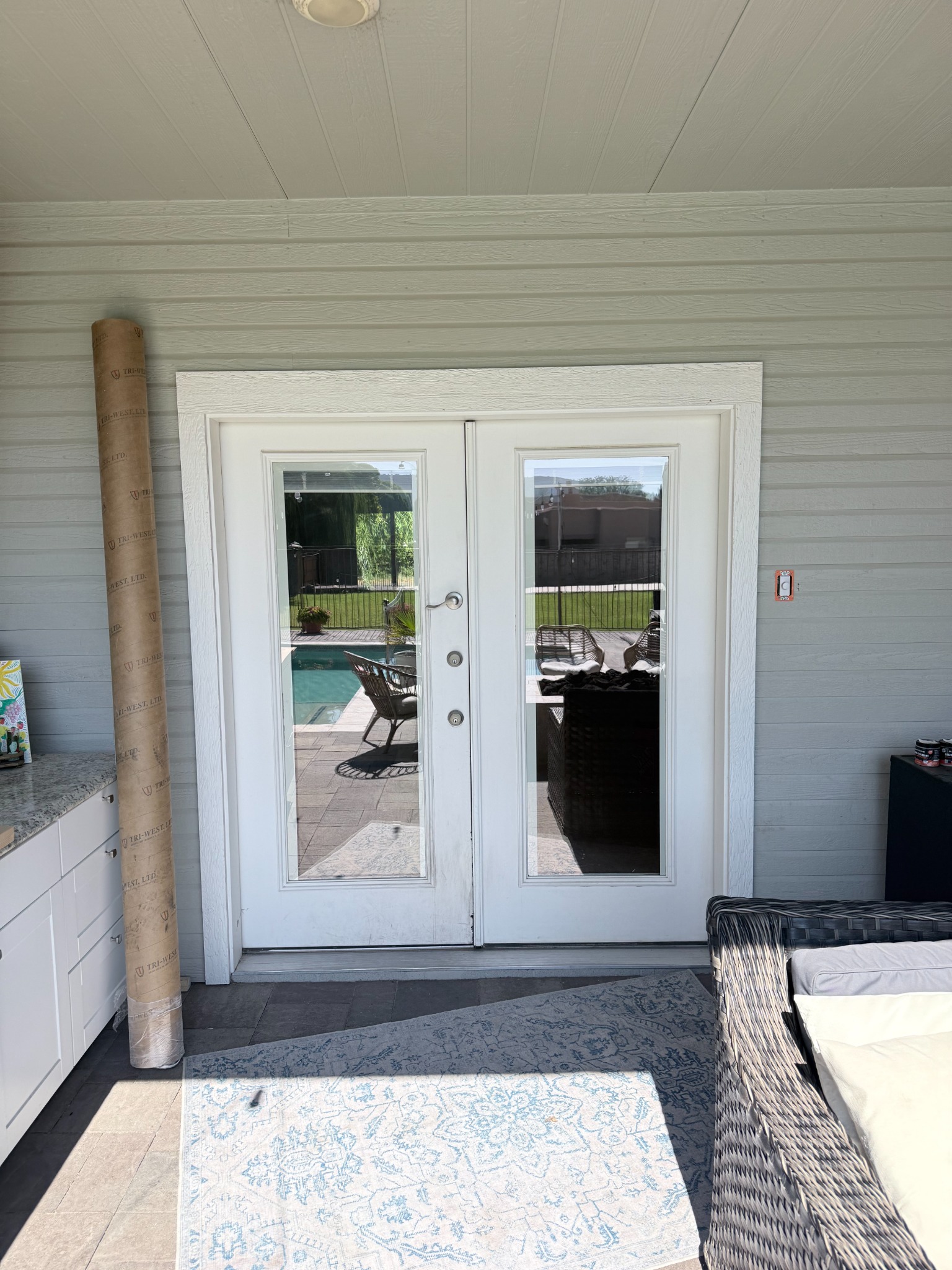 Original exterior French doors before the taller slider installation