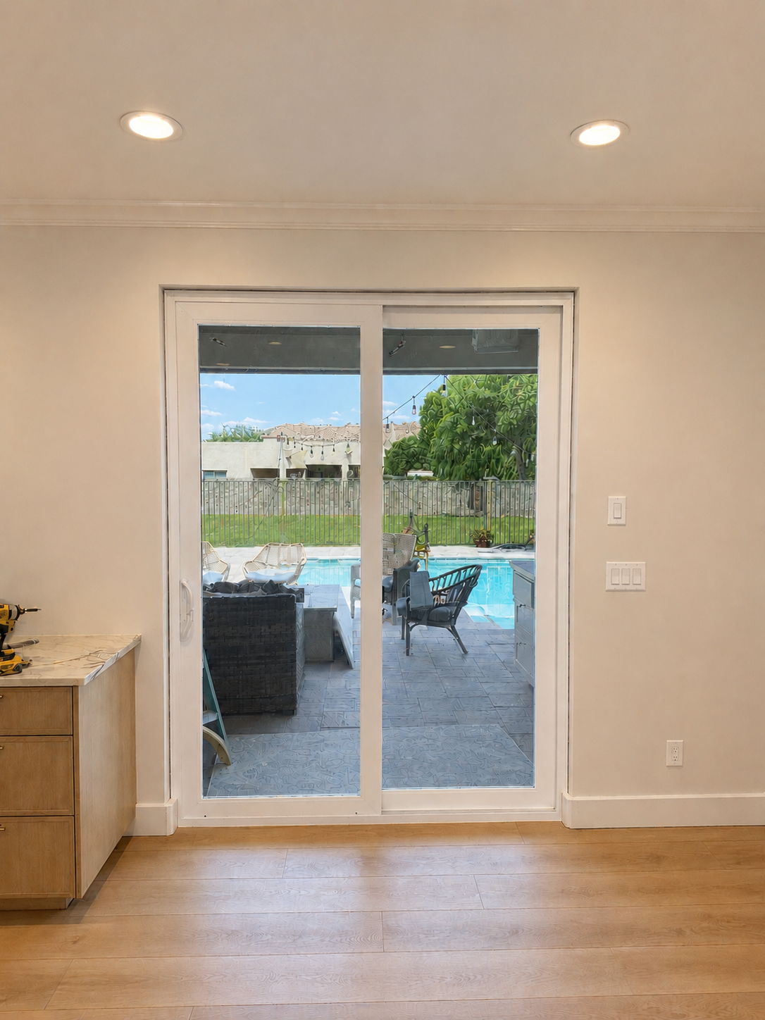 Completed 8-foot sliding glass door conversion viewed from inside the remodeled kitchen