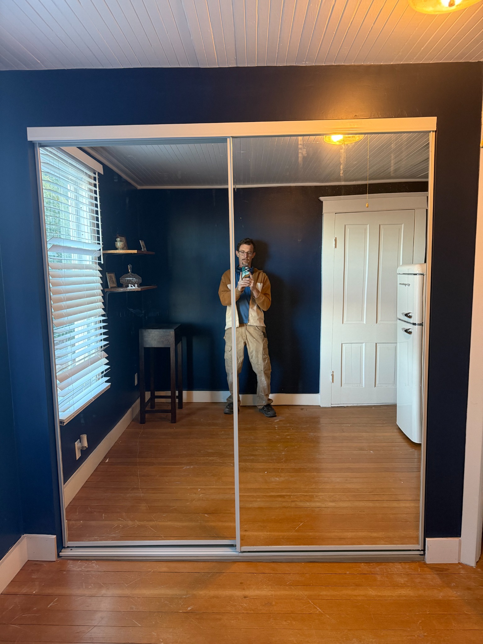 Finished closet addition with mirrored sliding doors in Jerome, Arizona