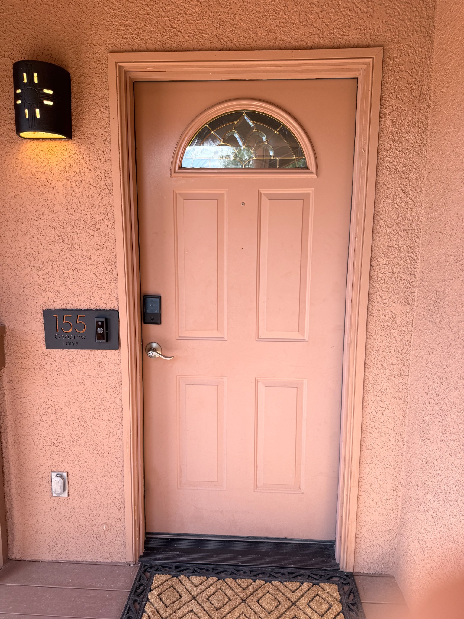 Original front entry door before replacement in Sedona, Arizona