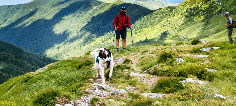 Man hiking with his dog