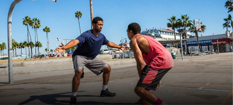 Two Guys playing basketball