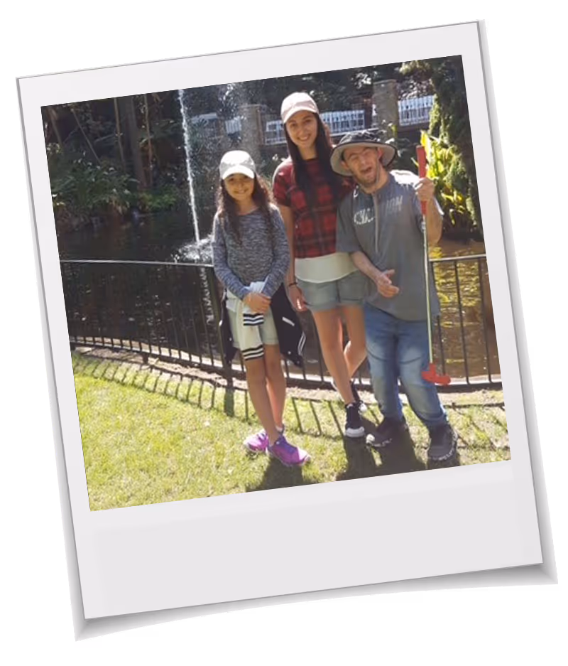 Patrick, with his loving sisters who help provide disability support