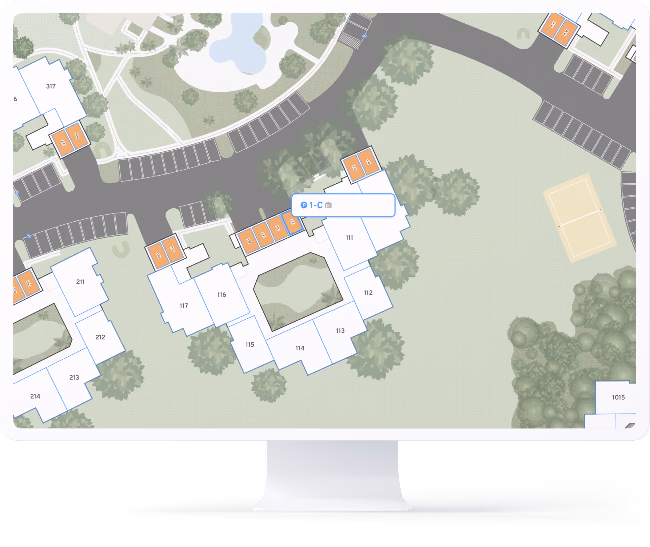 Digital map displayed on a monitor showing a parking and building layout with parking spaces shaded in orange, numbered building sections, surrounding pathways, green areas with trees, and a basketball court on the right side. A tooltip highlights parking number 1-C.