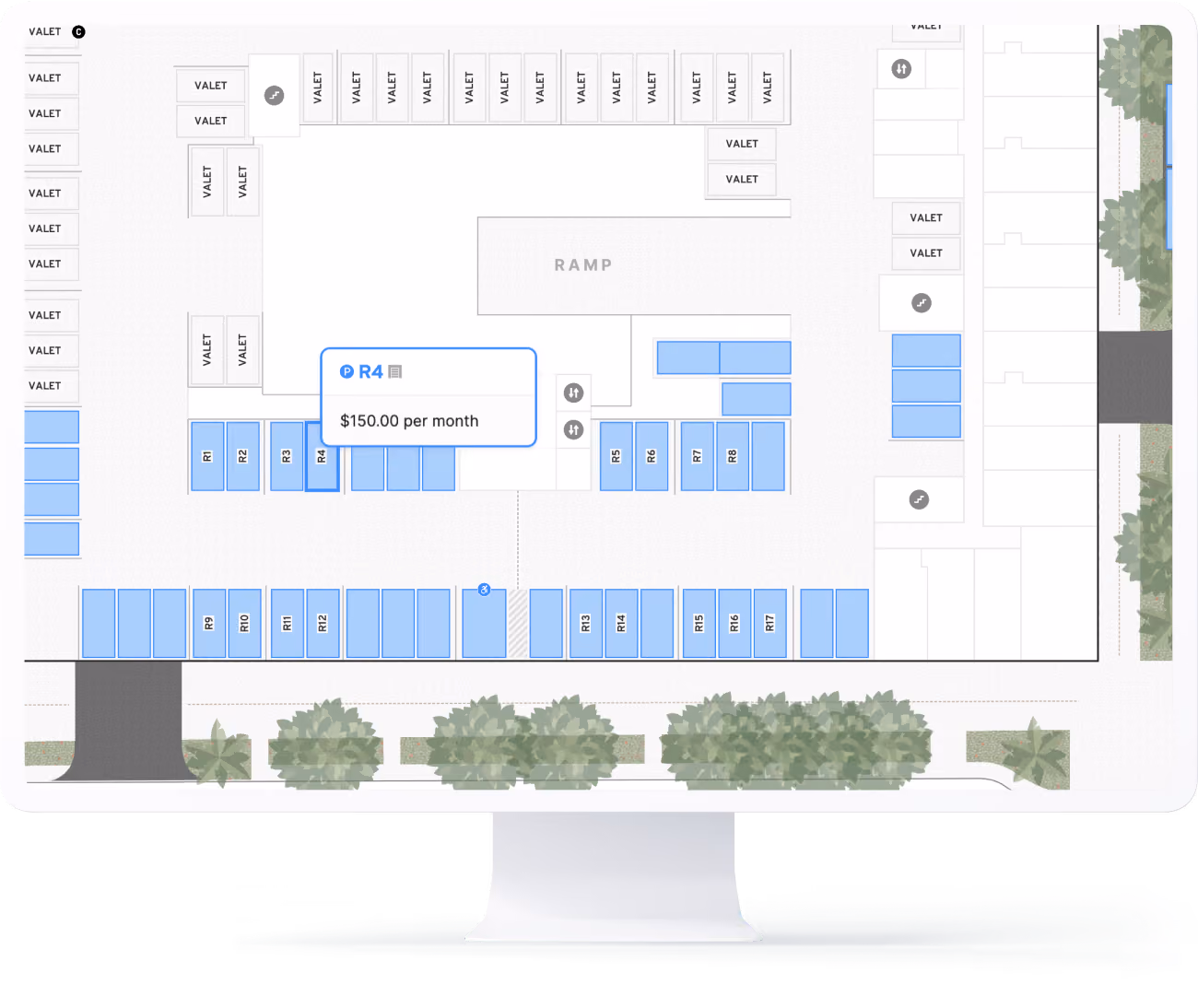 Computer screen displaying a parking layout map showing valet and reserved parking spaces marked in blue, with a highlighted space R4 priced at $150.00 per month and a central ramp area.