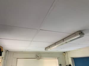 Certified asbestos ceiling tile removal team working in NH & MA