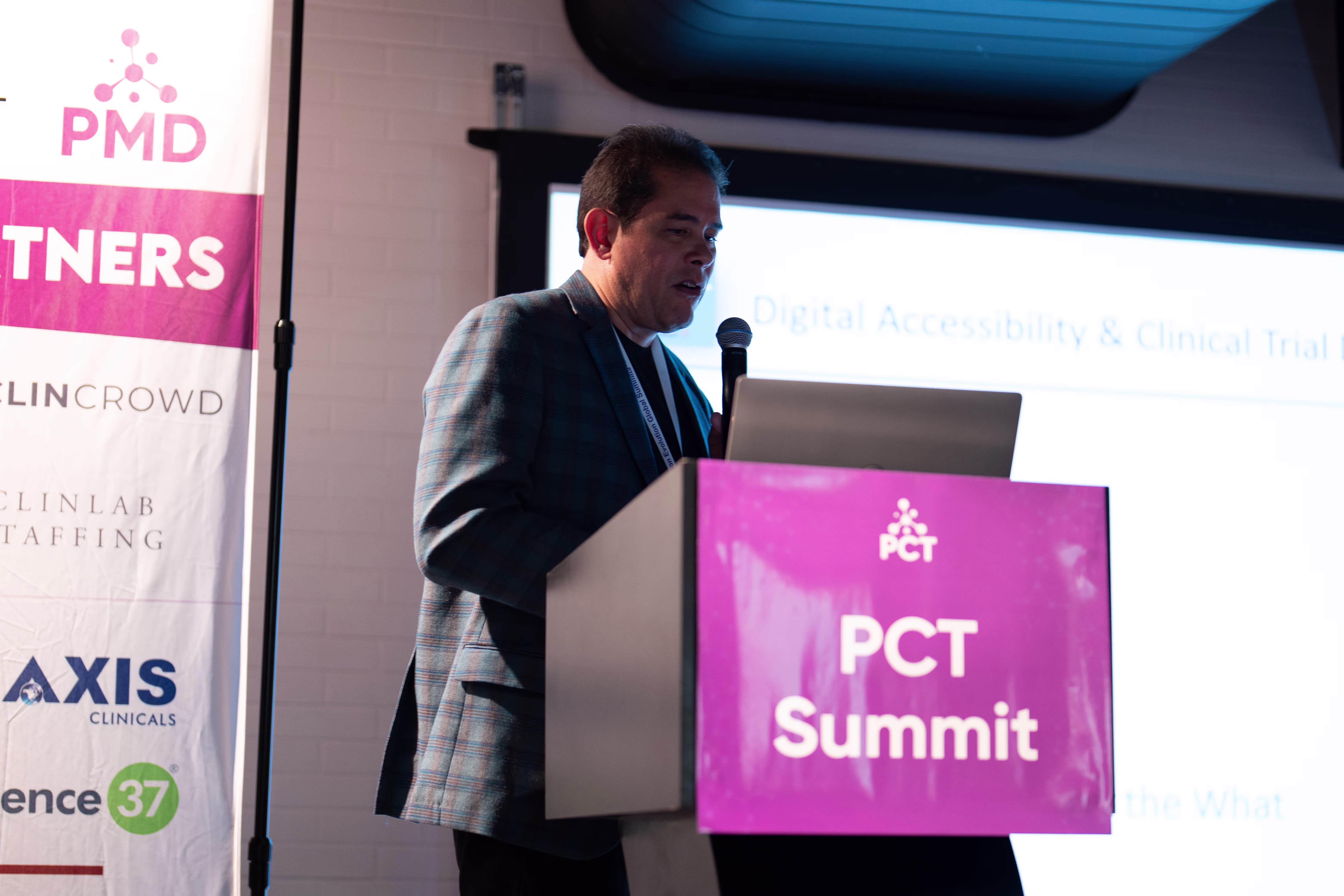 Panelists sharing insights on regulatory challenges in clinical research at Precision in Clinical Trials Summit